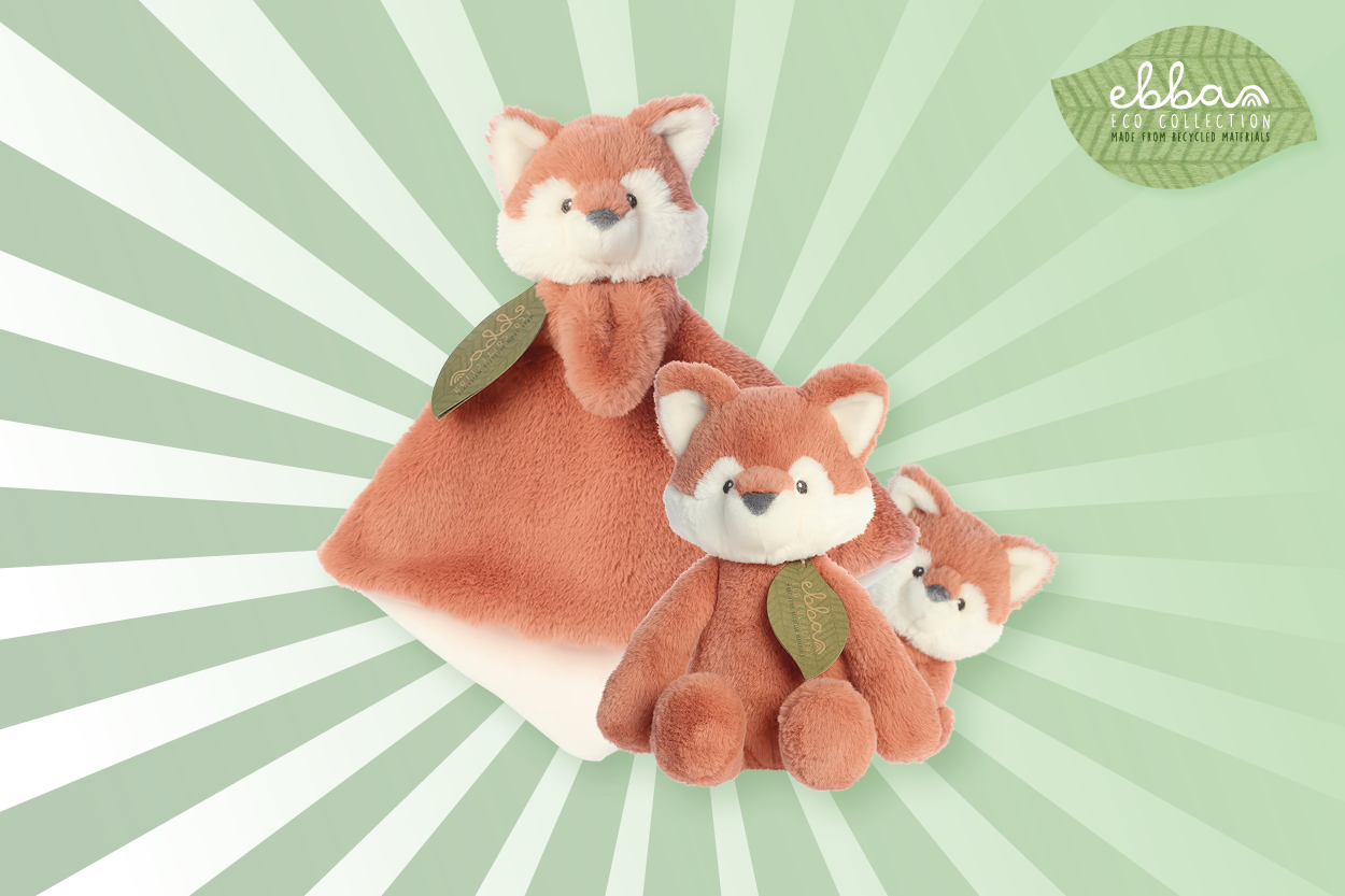 Grüner Strahlenhintergrund mit einem Kinderkuscheltuch von Aurora