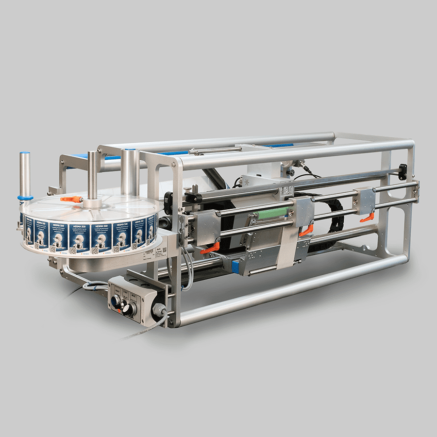 Maschine zur Etikettierung mit rotierender Scheibe und mechanischen Komponenten, die für die industrielle Anwendung konzipiert ist.