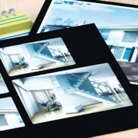 Fotoalbum mit Fotos, die mit Fotoblebern eingeklebt sind