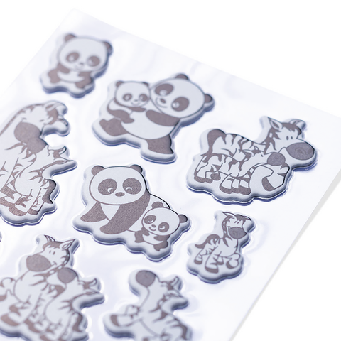 Tieraufkleber mit Pandas, Zebras und anderen Tieren in verschiedenen Posen auf einem transparenten Hintergrund.