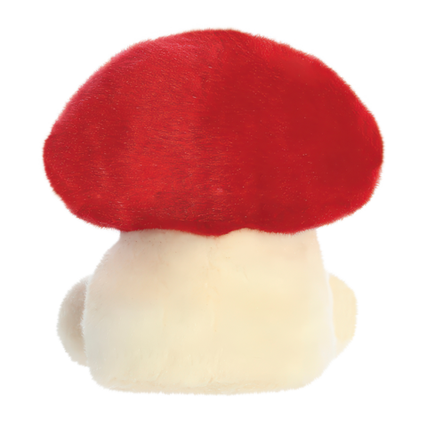 Ein plüschiger Toad-Charakter mit einem roten Hut und einem beigen Körper, von hinten gesehen.